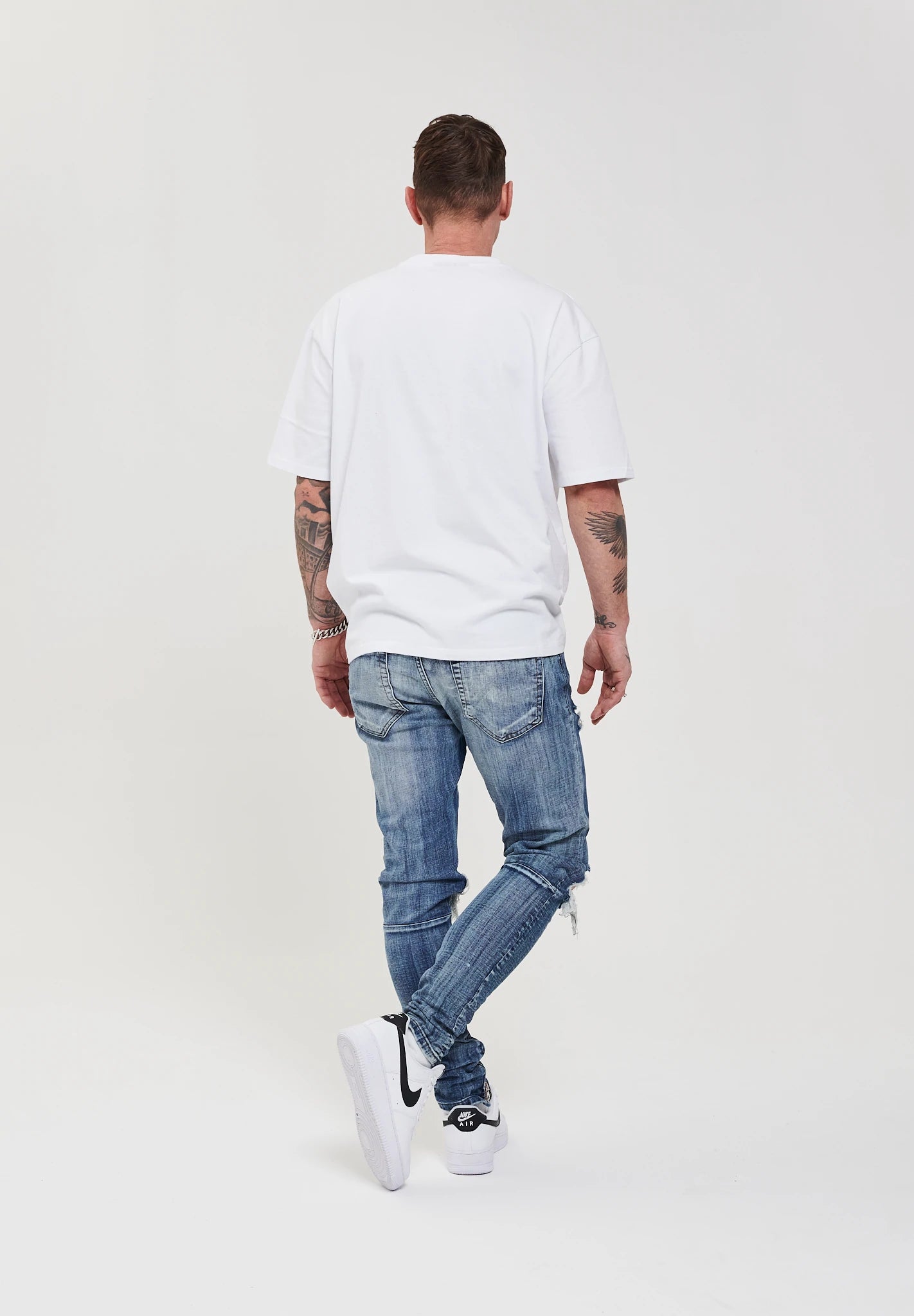 DESTROYED SKINNY FIT JEANS