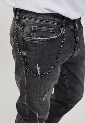 DESTROYED TAPERED FIT JEANS